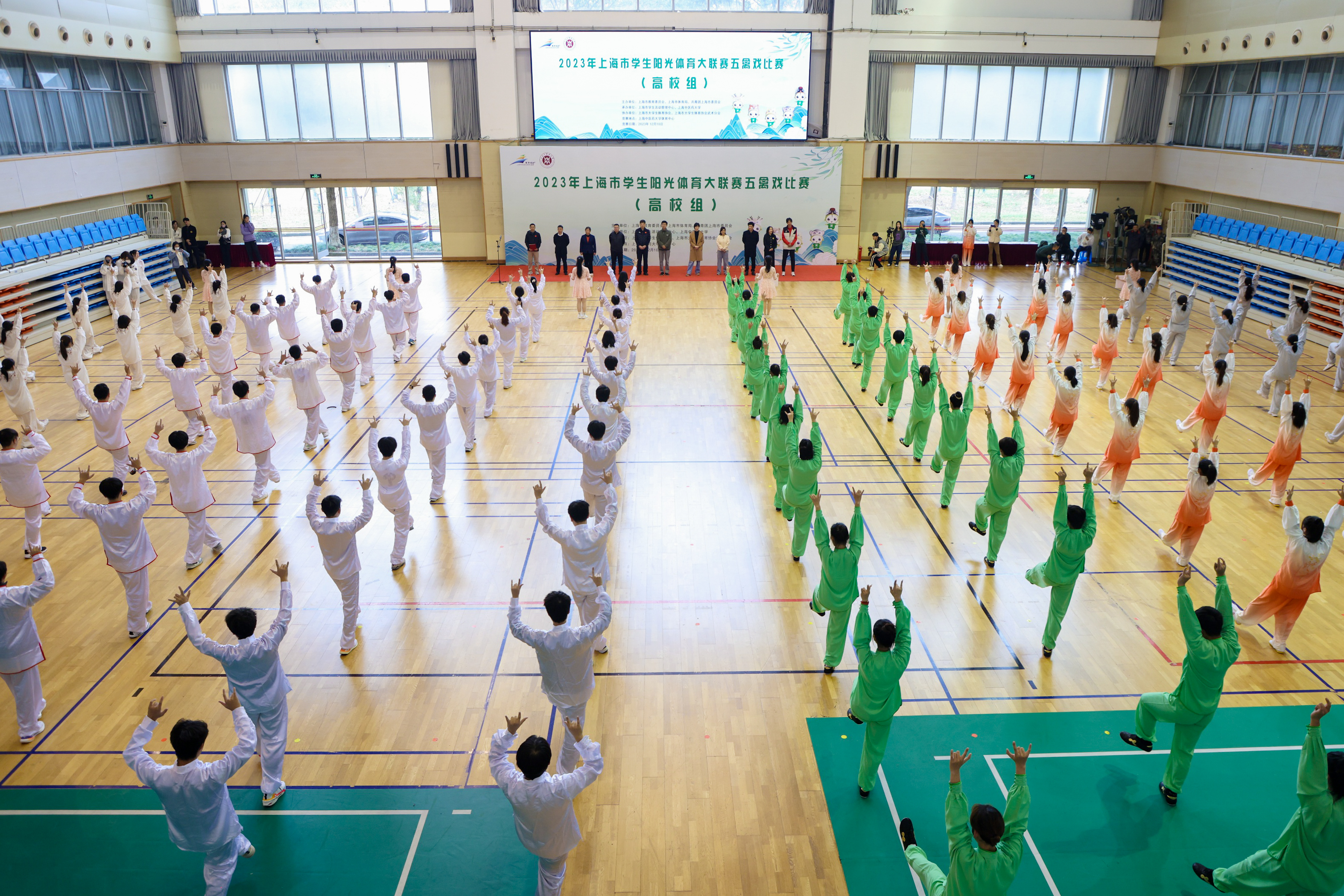 推动传统功法五禽戏进校园，首届上海市学生阳光体育大联赛五禽戏比赛（高校组）举行